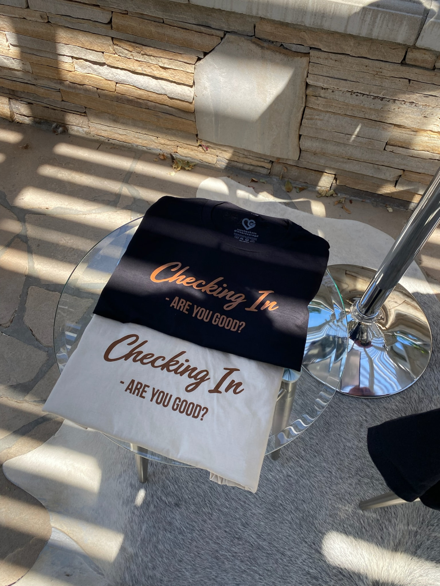 Original Talk Derby Checking In shirts folded on a table