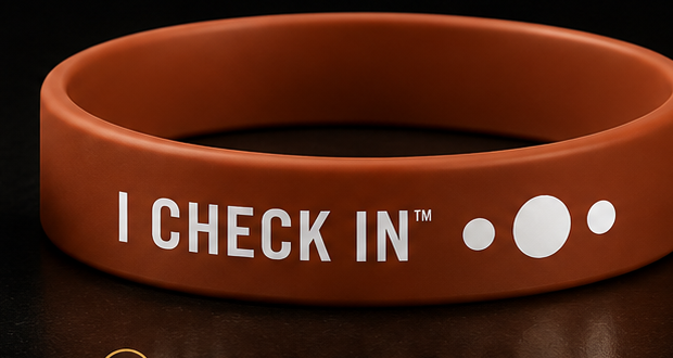 The Clay Rust I Check In wristband from Talk Derby